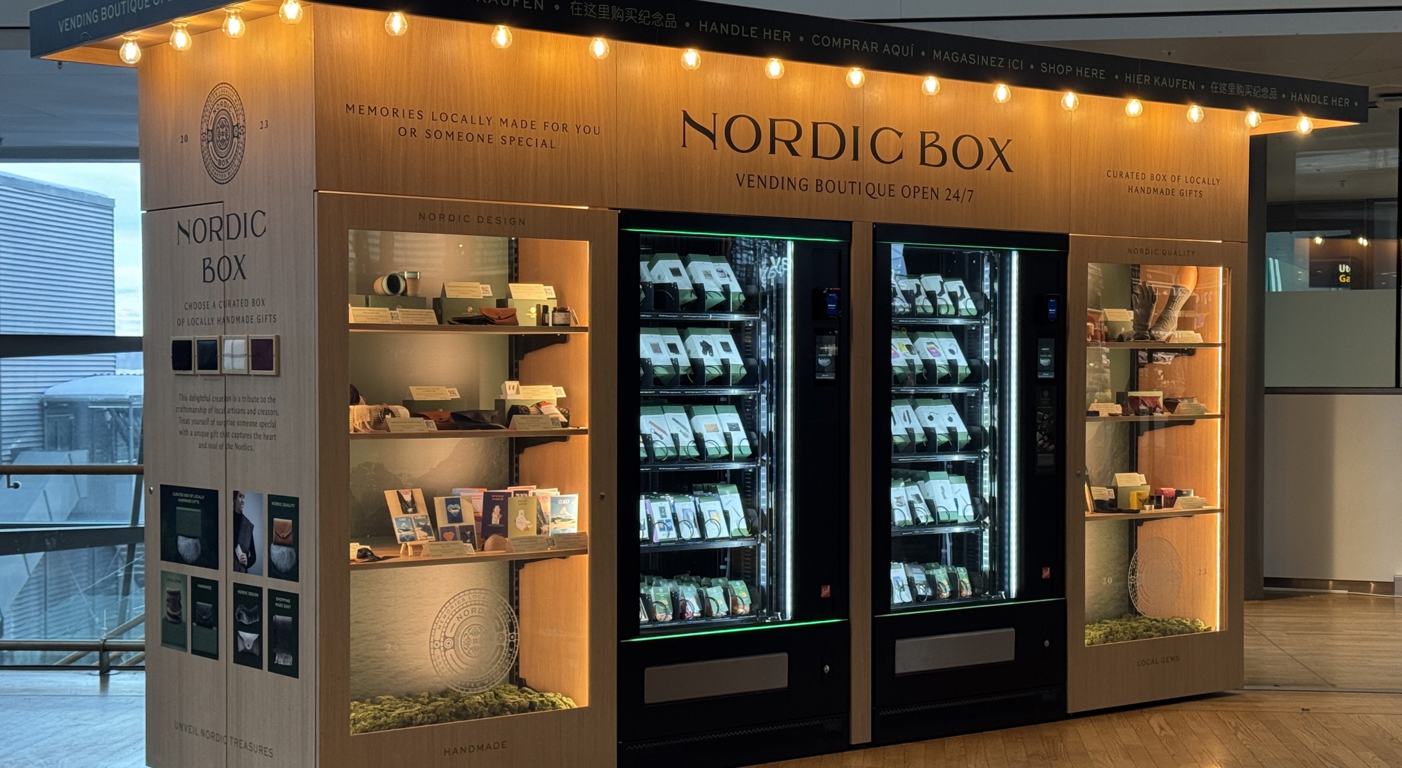 Nordic Box vending boutique with illuminated shelves and vending machines showcasing locally handmade gifts, located in a modern indoor setting